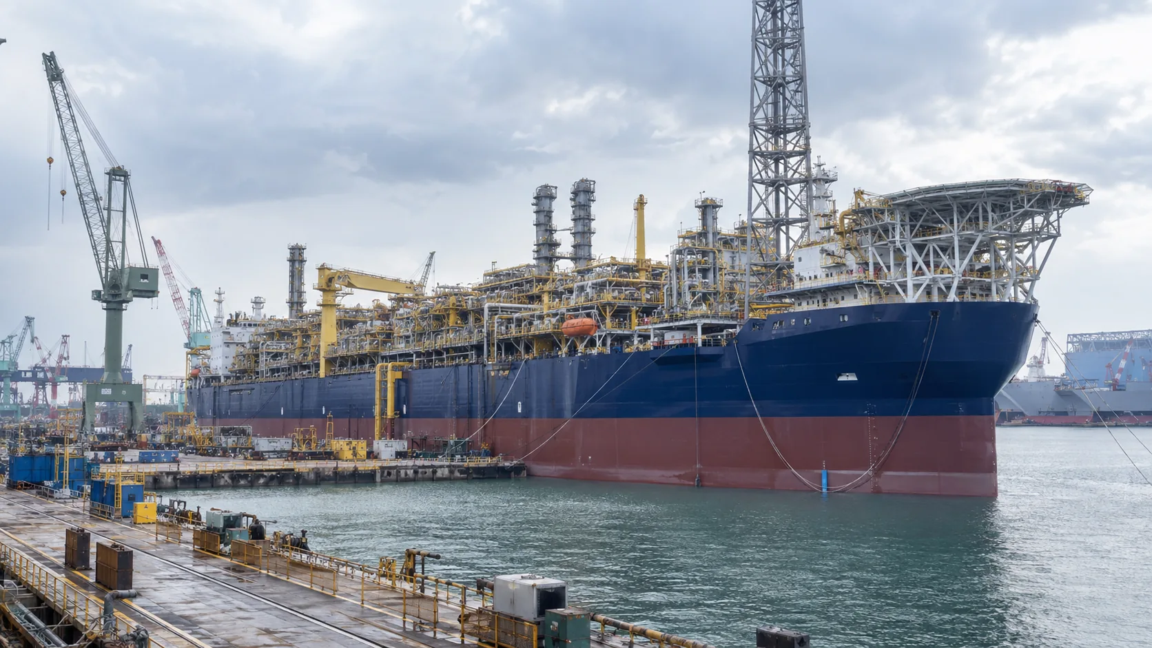 Illustrative FPSO vessel at shipyard, not a photograph of FPSO Perdana